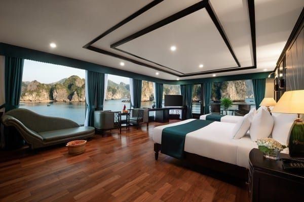 Aspira Cruise family suite with a chaise longue at the window