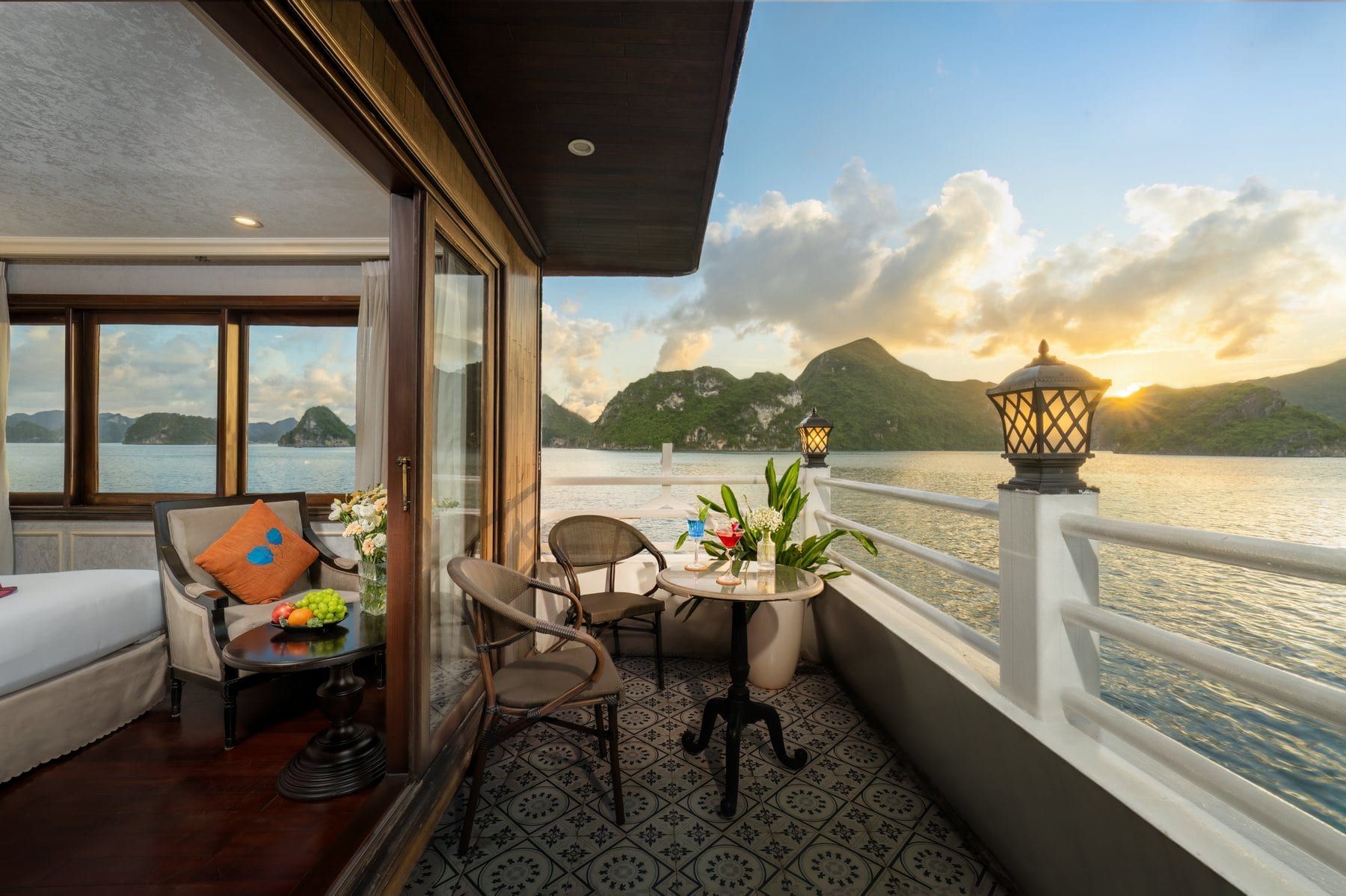 The private sun terrace of a Premium Terrace cabin, looking out at sunset