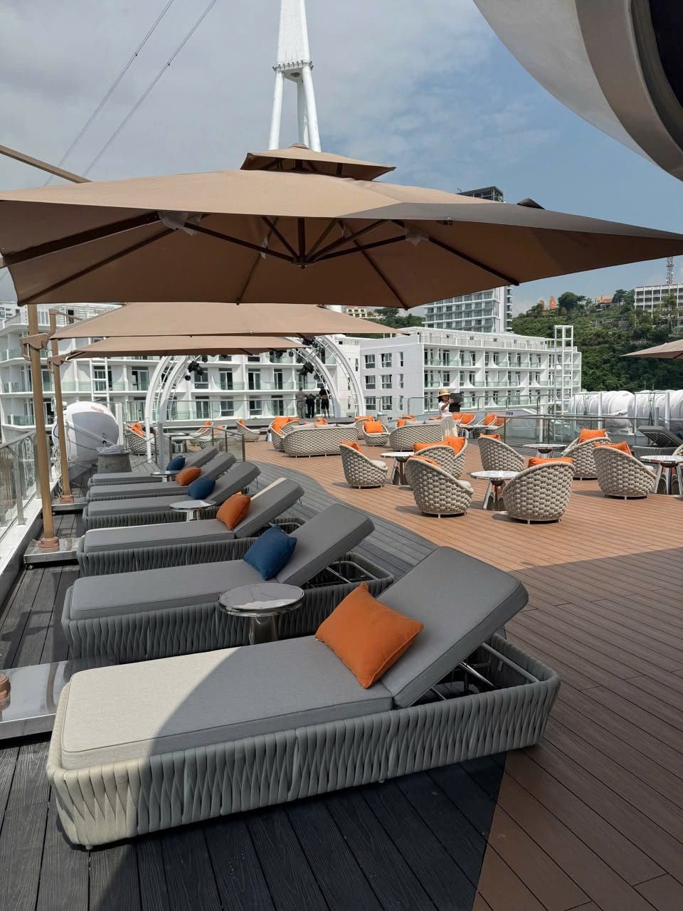 Loungers and parasols on the Athena Premium sun deck