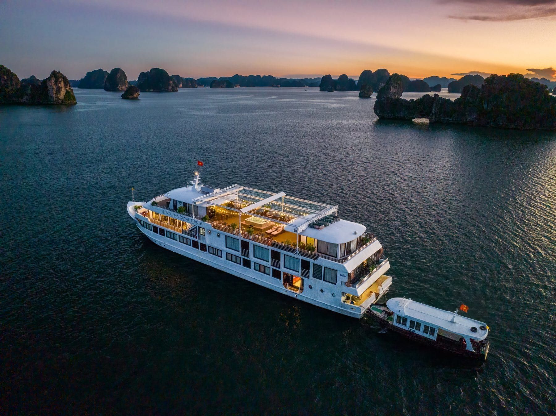 Athena Royal seen from above, tender alongside