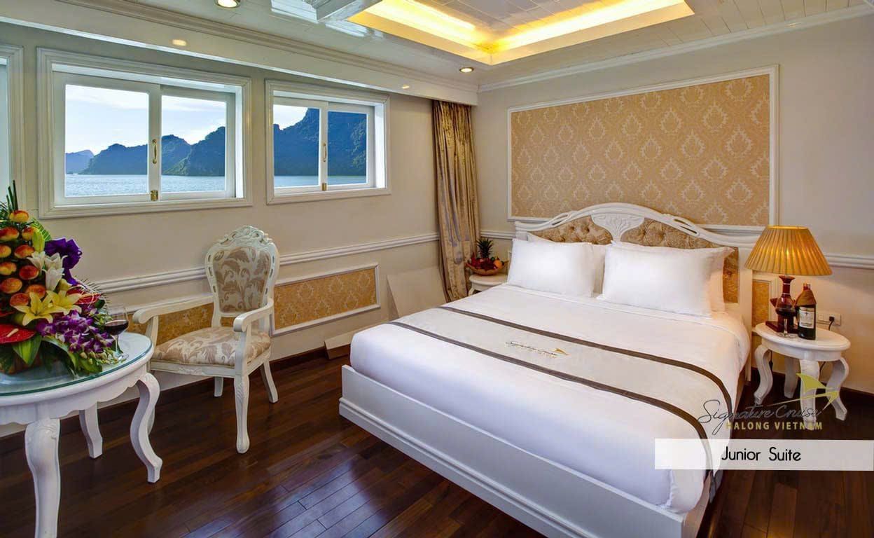 A Junior Suite made up as a double, with a seating corner