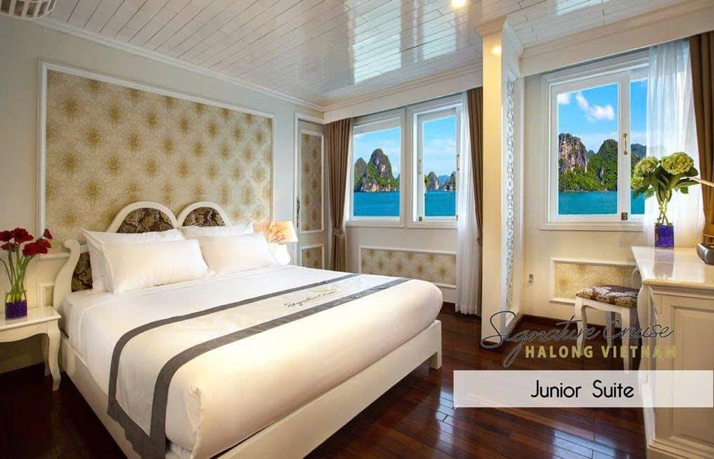 A Junior Suite, timber floor and windows facing the karsts