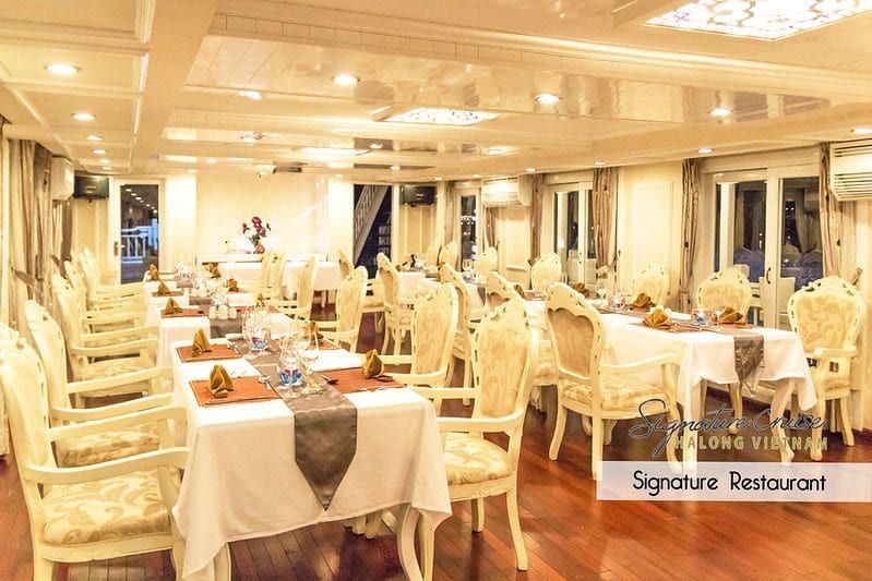 The 40-seat restaurant laid for dinner in cream and gold