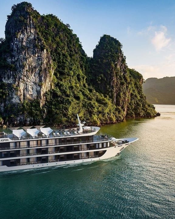Aspira Cruise passing below the limestone karsts of Ha Long Bay