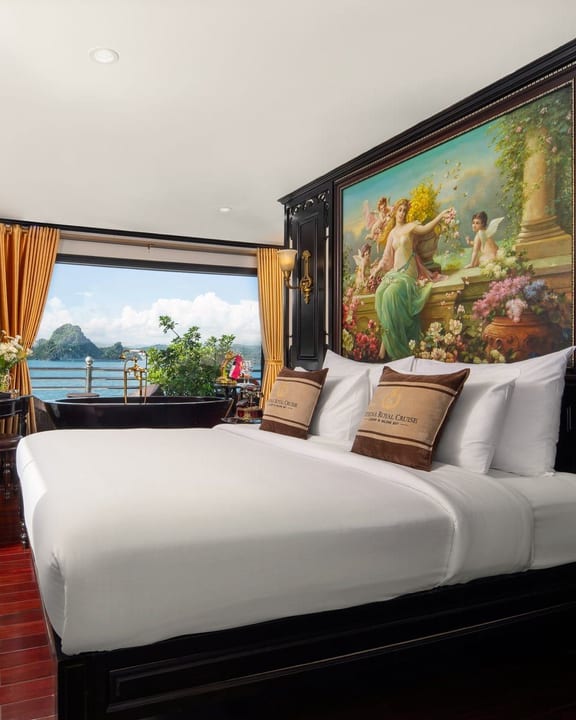 The Royal Suite aboard Athena Royal, a painted mural above the bed